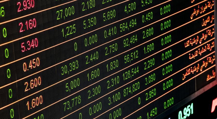 Stock exchange trading screens showing listed securities