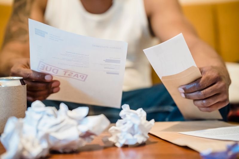 An owner reviewing finances before a property sale
